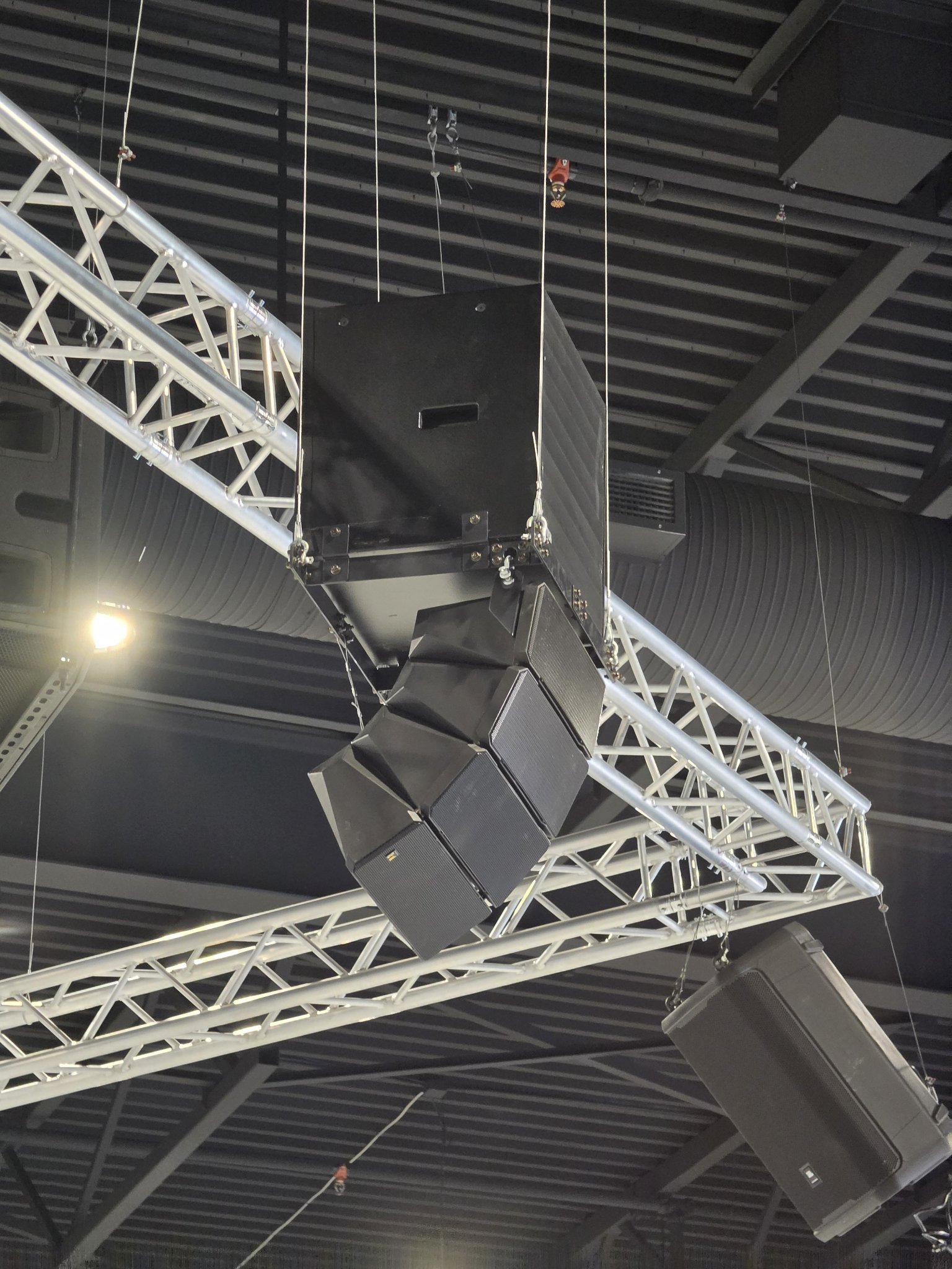 Pro audio speaker cluster on truss rig in Vernon - commercial install