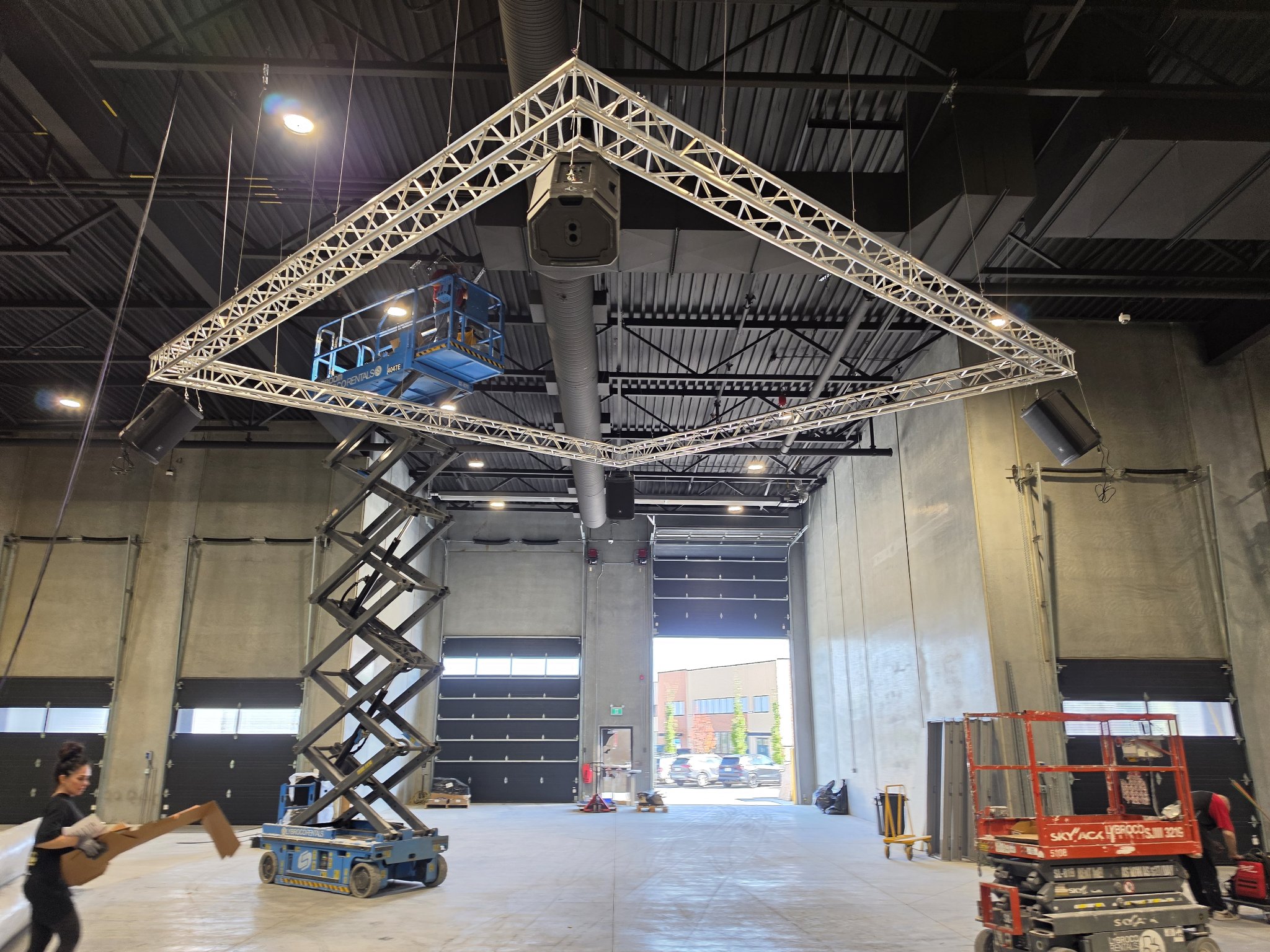 Commercial speaker truss installation in Peachland in progress